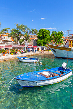 View of harbourside restaurants in Cavtat on the Adriatic Sea, Cavtat, Dubrovnik Riviera, Croatia, Europe