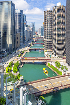 View of Water Taxi on Chicago River from rooftop terrace, Downtown Chicago, Illinois, United States of America, North America