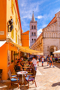 View of busy restaurant and Cathedral of St. Anastasia, Zadar, Zadar county, Dalmatia region, Croatia, Europe