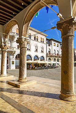 View of cafes from arches of the Town Hall in Forum Square, Pula, Istria County, Croatia, Adriatic, Europe