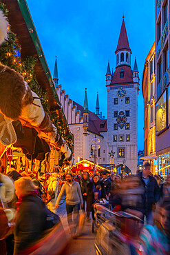 View of Old Town Hall and bustling Christmas Market in Marienplatz at dusk, Munich, Bavaria, Germany, Europe