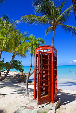 Beach and red telephone box, Dickenson Bay, St. Georges, Antigua, Leeward Islands, West Indies, Caribbean, Central America