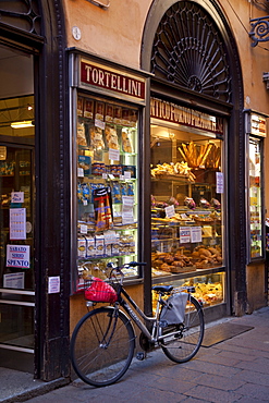 Back street bakers shop and bicycle, Bologna, Emilia Romagna, Italy, Europe