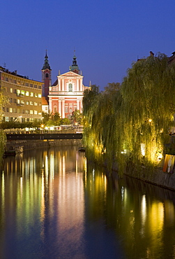 The Church of the Annunciation on the Ljubljanica River at dusk, Ljubljana, Slovenia, Europe