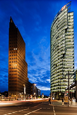 Exterior of Kollhoff Tower and Deutsche Bahn Tower at night, Potsdamer Platz, Berlin, Germany, Europe