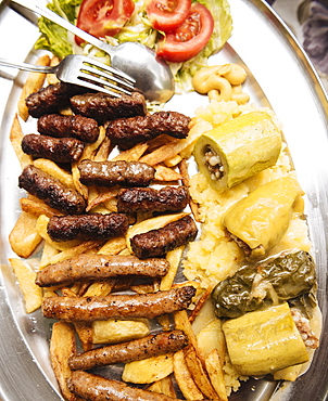 Traditional dish of cevapi and sausages, Mostar, Bosnia and Hercegovina, Europe