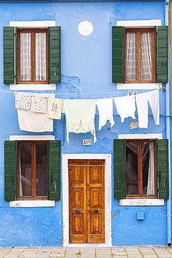 A colorful house on Burano, Venice, Veneto, Italy, Europe