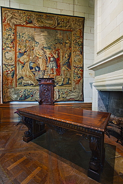 A beautifully coloured tapestry and carved wooden table in the quarters of Francois 1er, Chateau de Chambord, UNESCO World Heritage Site, Loir-et-Cher, Centre, France, Europe