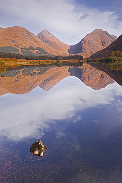 Mountains reflected in Lochan Urr in Glen Etive, Highlands, Scotland, United Kingdom, Europe 