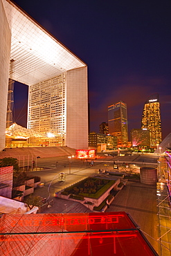 High rise office buildings and La Grande Arche in the La Defense area at night, Paris, France, Europe 