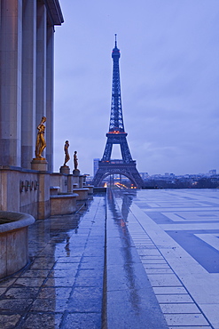 The Eiffel Tower under rain clouds, Paris, France, Europe 