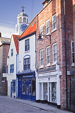 Narrow street in the seaside town of Whitby in the North York Moors National Park, Yorkshire, England, United Kingdom, Europe