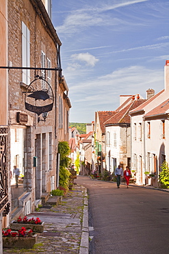 Looking down the main street in the hilltop village of Vezelay in the Yonne area of Burgundy, France, Europe