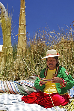 Portrait of a Uros Indian woman, Islas Flotantes (Floating Islands), Lake Titicaca, Peru, South America