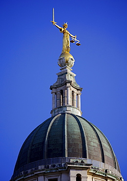 Scales of Justice above the Old Bailey Law Courts (Central Criminal Court) on former site of Newgate Prison, London, England, United Kingdom, Europe 