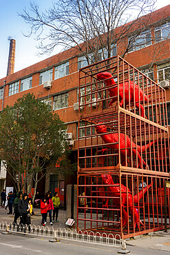 Red dinosaurs sculpture by Sui Jianguo in Dashanzi Art District, Beijing, China, Asia