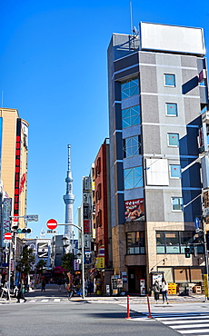 Tokyo street scene with the Sky Tree Tower in background, Tokyo, Japan, Asia