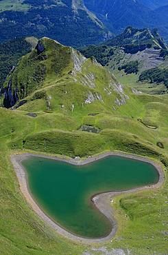 Montagnon Lake in the shape of a heart, Ossau Valley, Pyrenees, France