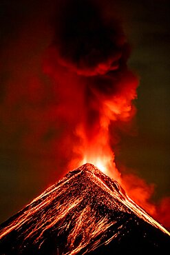 Volcán de Fuego (Volcano of fire) eruption at night, Sierra Madre de Chiapas, Guatemala.