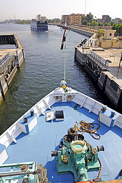 running cruise ships on the Nile at the passing of the lock between Luxor and Aswan