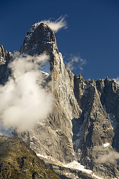 The Drus, a famous rock wall on the Mont blanc range. The pale grey area of rock upper rightis new rock revealed by a recent, massive rock fall.