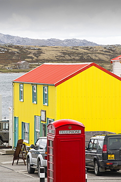 A gift shop in Port Stanley in the Falkland Islands with a British telephone box.