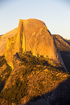 Half Dome at dusk from Glacier Point above Yosemite Valley, California, USA.