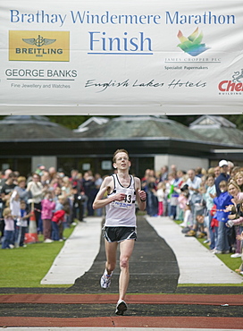 Competitors finishing the Windermere Marathon in the Lake District, Cumbria, England, United Kingdom, Europe