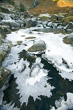 A partially frozen river in Easedale near Grasmere in the Lake District National Park, Cumbria, England, United Kingdom, Europe