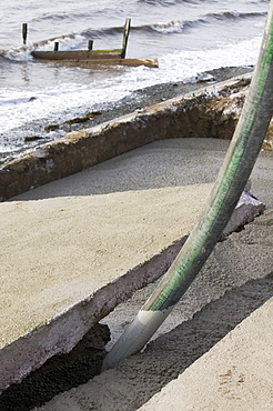 Repairing damage to the road between Allonby and Silloth caused by floods in 2008, Cumbria, England, United Kingdom, Europe