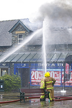 A fire being tackled by firemen in Ambleside, Lake Distruct, Cumbria, England, United Kingdom, Europe