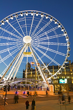 A ferris wheel in Manchester city centre, England, United Kingdom, Europe