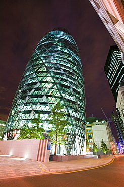 The Swiss Re Tower at night in London, England, United Kingdom, Europe