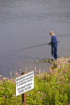 A fisherman on the River Ribble at Preston, Lancashire, England, United Kingdom, Europe