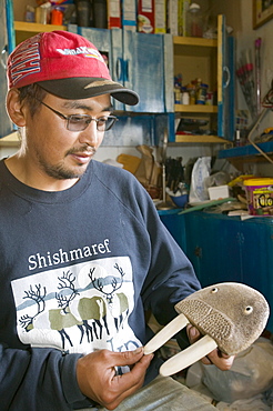 An Inuit man with a traditional eskimo art on Shishmaref, a tiny island inhabited by around 600 Inuits, between Alaska and Siberia in the Chukchi Sea, United States of America, North America