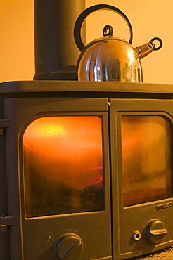 Boiling a kettle on a wood burning stove is a carbon neutral way of heating, United Kingdom, Europe