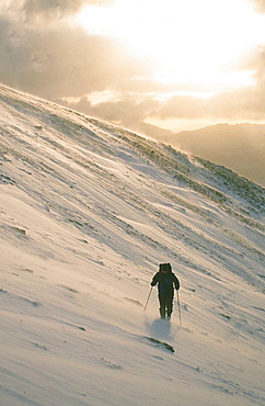 A mountaineer on Seat Sandal in the Lake District in winter weather, Cumbria, England, United Kingdom, Europe