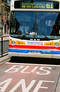 Bus in a bus lane in Carlisle, Cumbria, England, United Kingdom, Europe