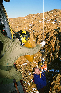 RAF Sea King Helicopter crew attend a mountain rescue incident in the Lake District, Cumbria, England, United Kingdom, Europe