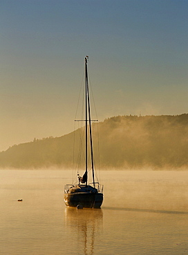 Morning mist over Lake Windermere in the Lake District National Park, Cumbria, England, United Kingdom, Europe