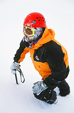 A mountaineer in winter in the Cairngorms, Scotland, United Kingdom, Europe