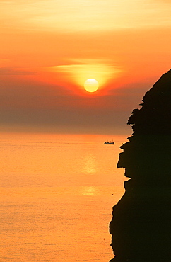 Fishing boat off St. Bees Head at sunset, West Cumbria, England, United Kingdom, Europe