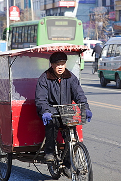 A cycle taxi on the streets of Suihua in Heilongjiang Province, Northern China, Asia