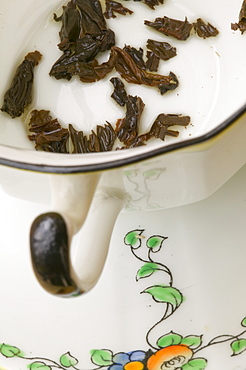 Tea leaves in a china cup