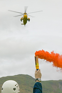 Emergency flare to attract incoming Sea King Helicopter, Lake District, Cumbria, England, United Kingdom, Europe