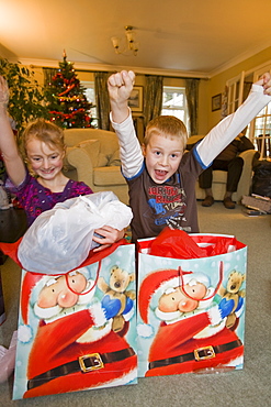 Children with Christmas presents