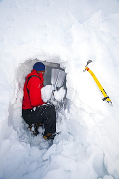 A group of mountaineers building snow holes on Cairngorm in the Cairngorm National Park in Scotland, United Kingdom, Europe