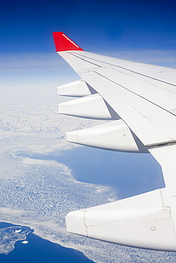 Icebergs and sea ice of the Greenland ice sheet in East Greenland from the air, Polar Regions