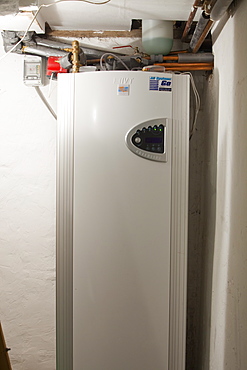 A ground source heat pump with pipes coming up from 55 metres down in a house in Ambleside, Cumbria,, England, United Kingdom, Europe