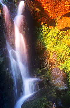 Late evening light on a waterfall above Thirlmere in the Lake District Cumbria, England, United Kingdom, Europe